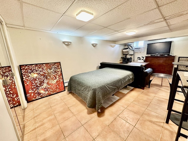 306 Columbia Ave, Jersey City, NJ 07307 - bedroom with a paneled ceiling and light tile patterned floors