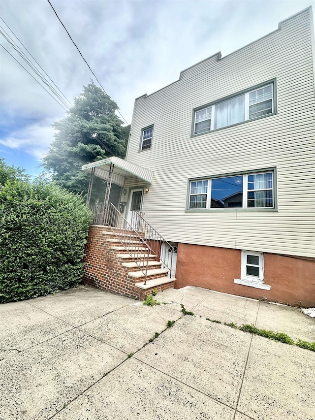 306 Columbia Ave, Jersey City, NJ 07307 - back of property featuring a patio