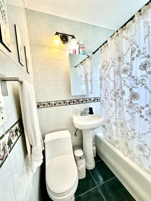 306 Columbia Ave, Jersey City, NJ 07307 - bathroom featuring tile walls, tile patterned flooring, shower / tub combo with curtain, and ornamental molding