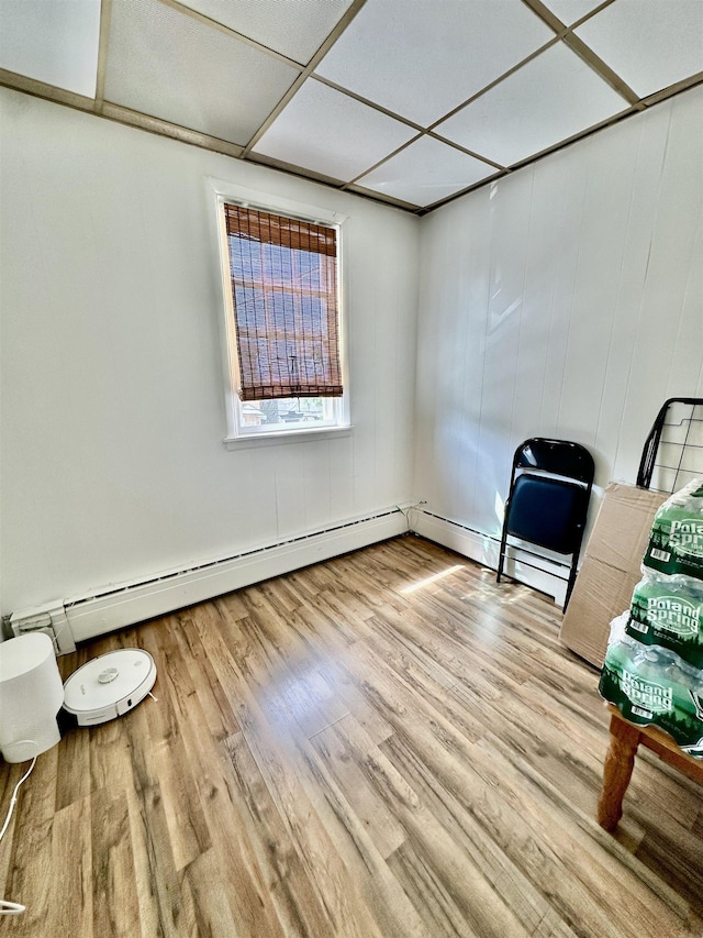306 Columbia Ave, Jersey City, NJ 07307 - spare room featuring wood finished floors and a baseboard radiator