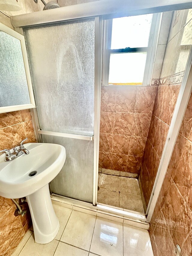 306 Columbia Ave, Jersey City, NJ 07307 - bathroom featuring a shower stall and tile patterned floors
