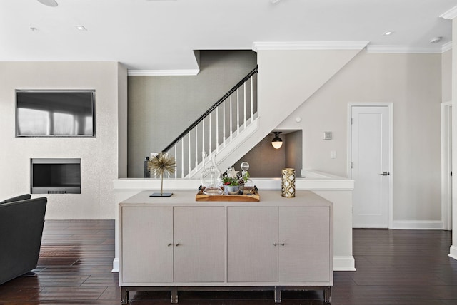 interior space featuring crown molding, recessed lighting, baseboards, and hardwood / wood-style flooring