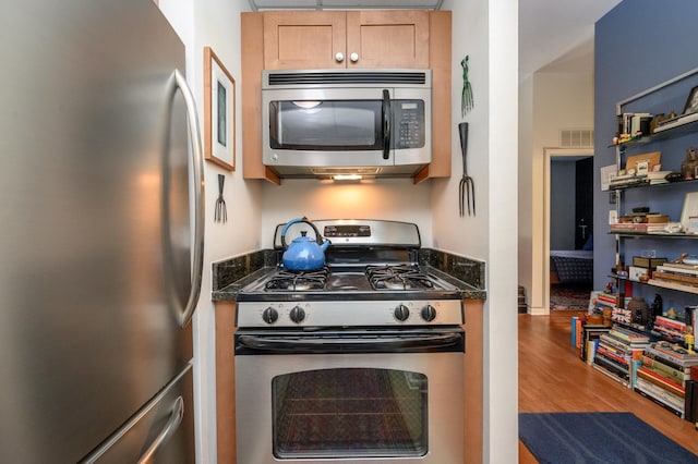 187 Wayne St Unit 205, Jersey City, NJ 07302 - kitchen featuring appliances with stainless steel finishes and wood finished floors