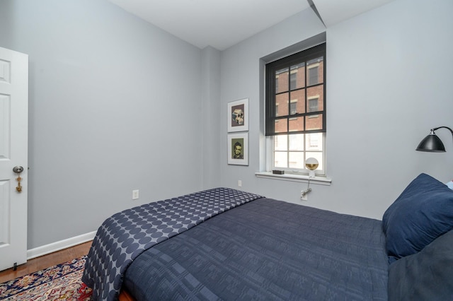 187 Wayne St Unit 205, Jersey City, NJ 07302 - bedroom with wood finished floors and baseboards