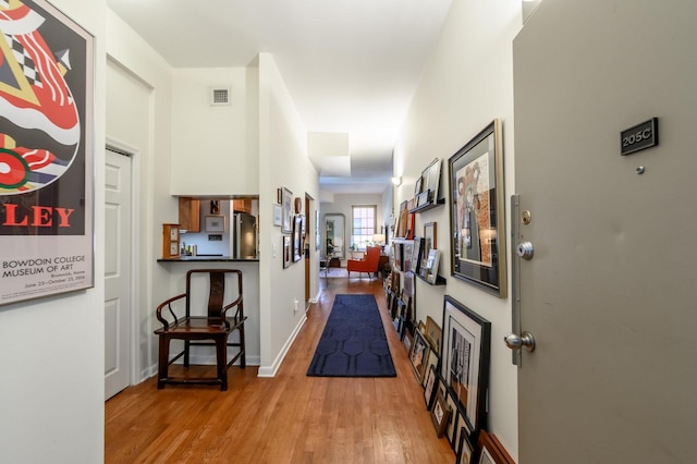 187 Wayne St Unit 205, Jersey City, NJ 07302 - corridor with wood finished floors and baseboards
