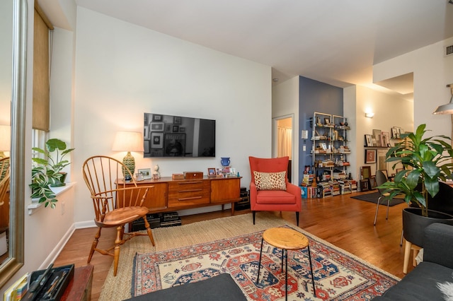 187 Wayne St Unit 205, Jersey City, NJ 07302 - living area featuring wood finished floors and baseboards