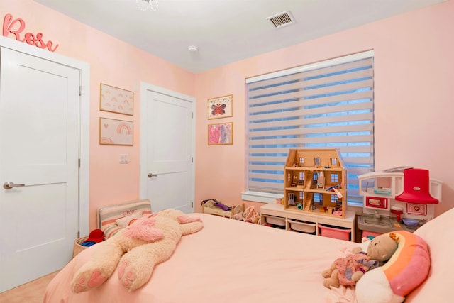 bedroom with visible vents