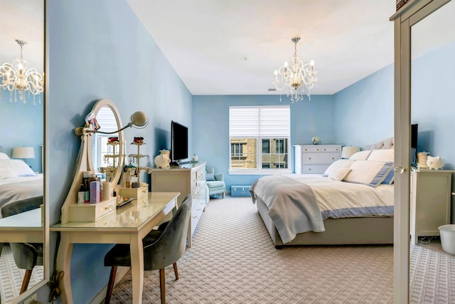 carpeted bedroom with an inviting chandelier