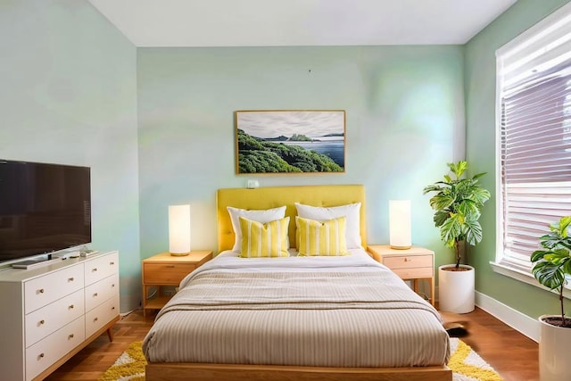 bedroom featuring baseboards