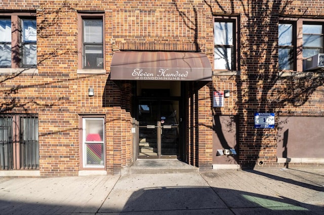 1100 83rd St Unit C1, North Bergen, NJ 07047 - property entrance featuring brick siding