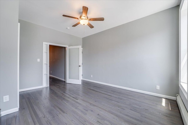 402 Grand St Unit 3S, Hoboken, NJ 07030 - unfurnished room featuring baseboard heating, ceiling fan, and dark wood finished floors