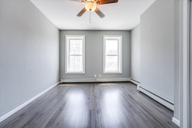 402 Grand St Unit 3S, Hoboken, NJ 07030 - unfurnished room with a baseboard radiator, ceiling fan, and wood finished floors