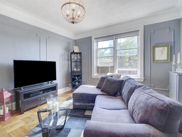 living area with a textured ceiling, cooling unit, and a notable chandelier