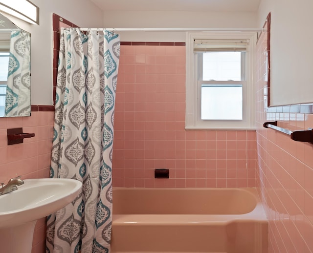 64 W 57th St, Bayonne, NJ 07002 - full bathroom featuring shower / bath combination with curtain, a sink, and tile walls
