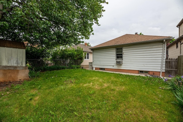 64 W 57th St, Bayonne, NJ 07002 - back of house featuring a shed, an outdoor structure, and cooling unit
