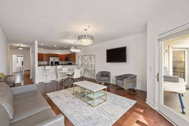 217 The Promenade Unit 217, Edgewater, NJ 07020 - living room with a chandelier, dark wood-style flooring, baseboards, and recessed lighting