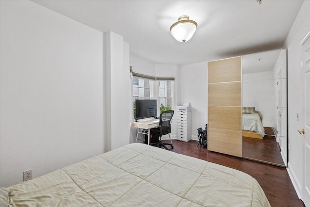 217 The Promenade Unit 217, Edgewater, NJ 07020 - bedroom featuring wood finished floors and baseboards