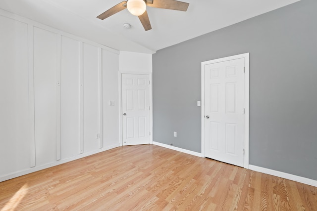 unfurnished bedroom with ceiling fan and light hardwood / wood-style flooring