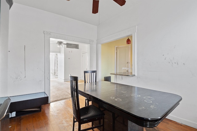 dining room with hardwood / wood-style flooring