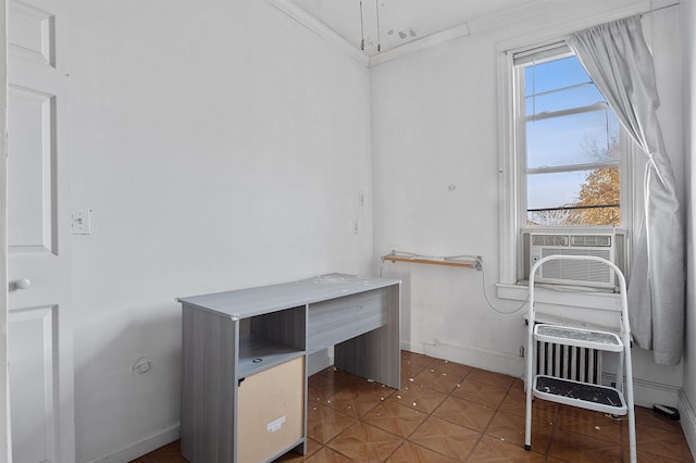 office space featuring crown molding, cooling unit, and a healthy amount of sunlight