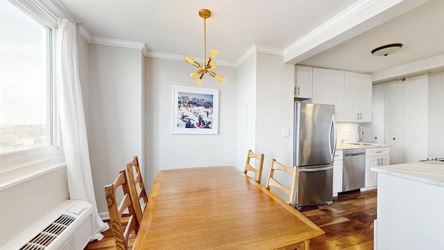 dining room featuring ornamental molding, a chandelier, a wall mounted air conditioner, and a wealth of natural light