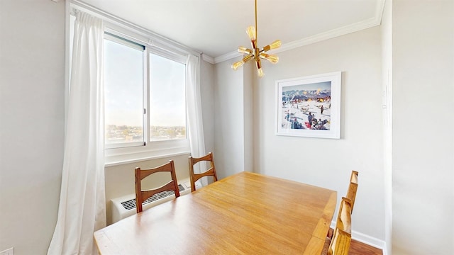 dining room with ornamental molding and a healthy amount of sunlight
