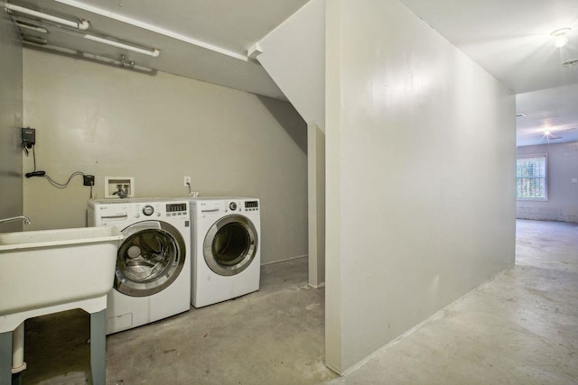 laundry room featuring separate washer and dryer