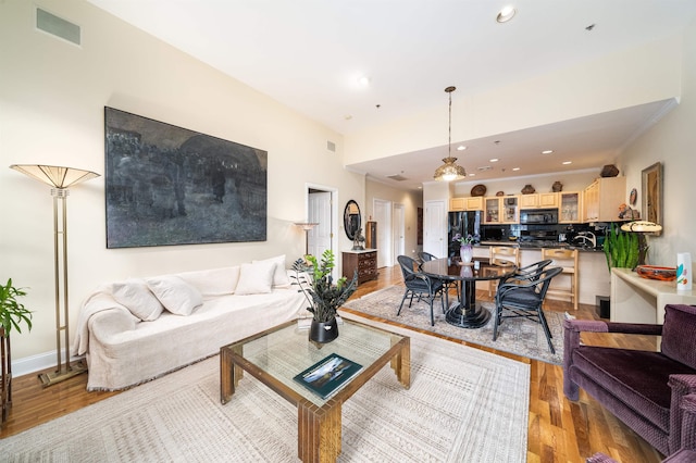 101 Park Ave Unit 3A, Hoboken, NJ 07030 - living area featuring light wood-type flooring and recessed lighting