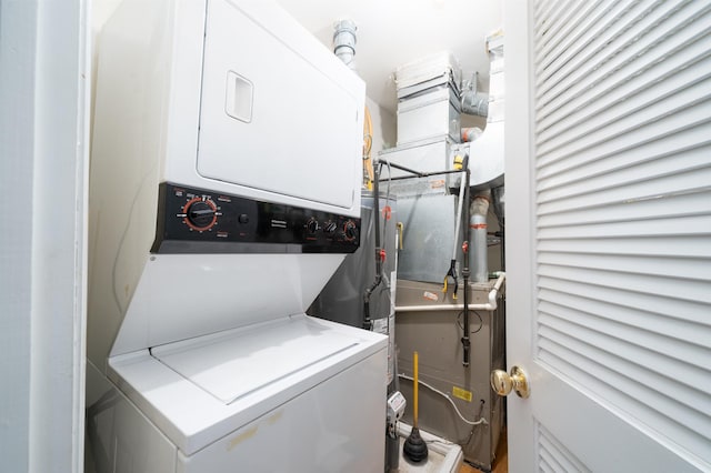 101 Park Ave Unit 3A, Hoboken, NJ 07030 - laundry room featuring estacked washer and dryer and pet washing station