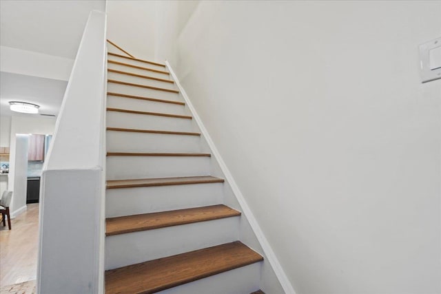 186 Wayne St Unit 118D, Jersey City, NJ 07302 - staircase featuring wood finished floors