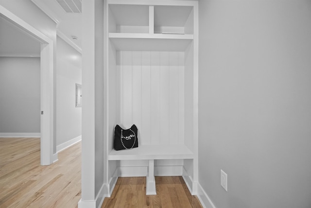 mudroom featuring wood-type flooring