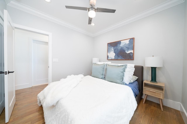 104 Poplar St Unit 1, Jersey City, NJ 07307 - bedroom with ornamental molding, light wood-style floors, recessed lighting, and ceiling fan