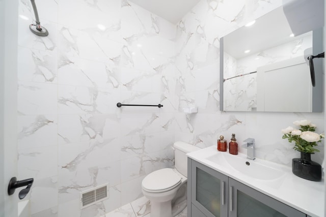 104 Poplar St Unit 1, Jersey City, NJ 07307 - bathroom with vanity and tile walls