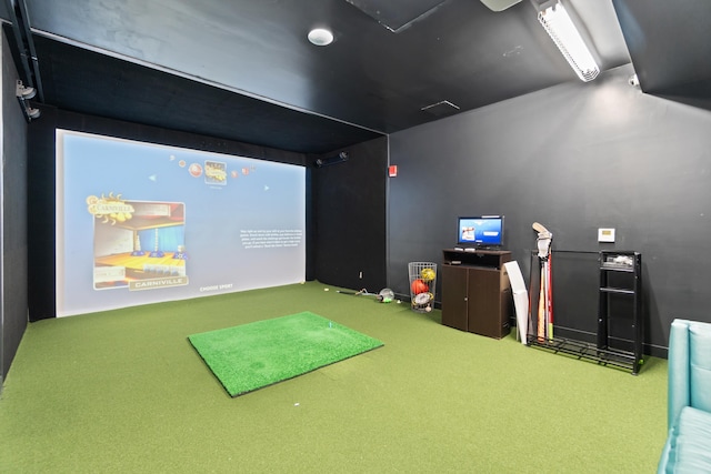 rec room with carpet floors, visible vents, and golf simulator