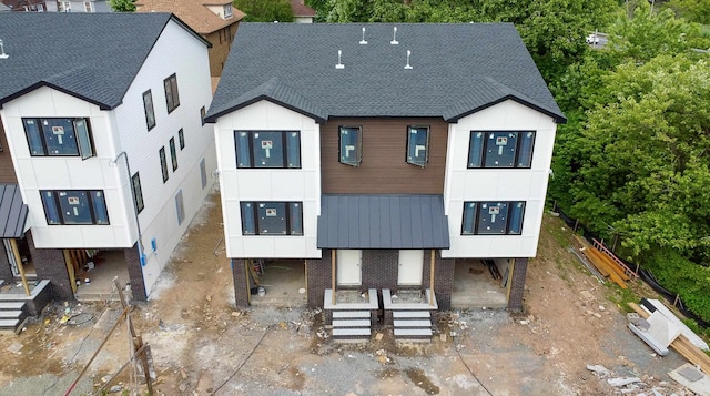 138 Weigands Ln, Secaucus, NJ 07094 - view of front facade with a shingled roof