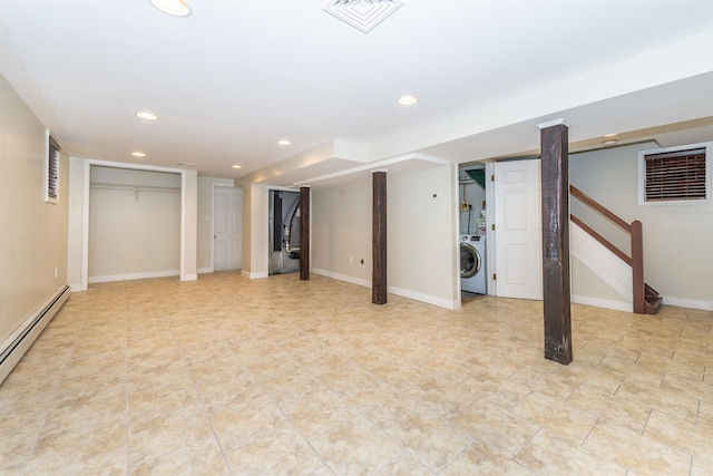 finished below grade area featuring visible vents, recessed lighting, baseboards, washer / dryer, and stairs