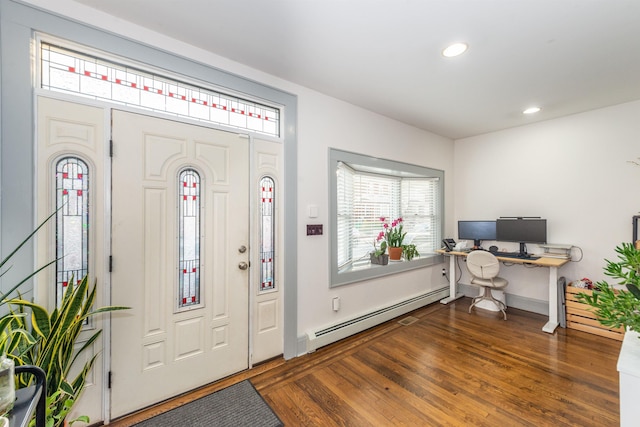 entrance foyer featuring recessed lighting, wood finished floors, and a baseboard radiator