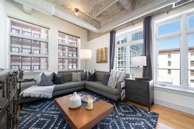 140 Bay St Unit 6E, Jersey City, NJ 07302 - living room featuring wood-type flooring and healthy amount of natural light