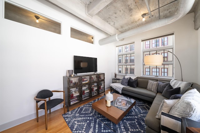 140 Bay St Unit 6E, Jersey City, NJ 07302 - living room with wood finished floors and baseboards