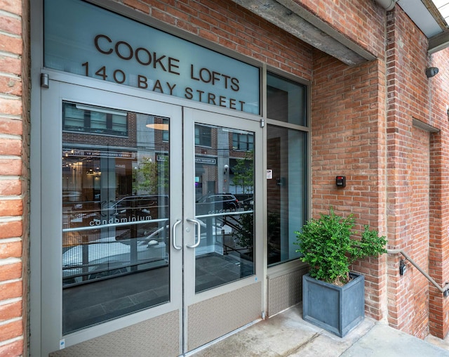 140 Bay St Unit 6E, Jersey City, NJ 07302 - property entrance with french doors and brick siding