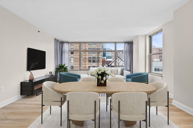 dining area featuring light hardwood / wood-style floors