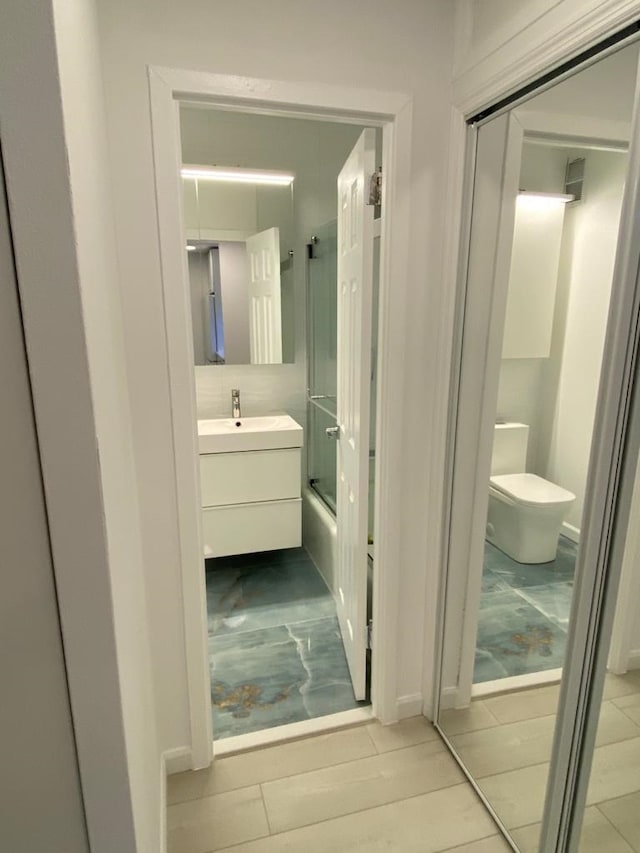 100 Manhattan Ave Unit 1301, Union City, NJ 07087 - full bath featuring vanity and combined bath / shower with glass door