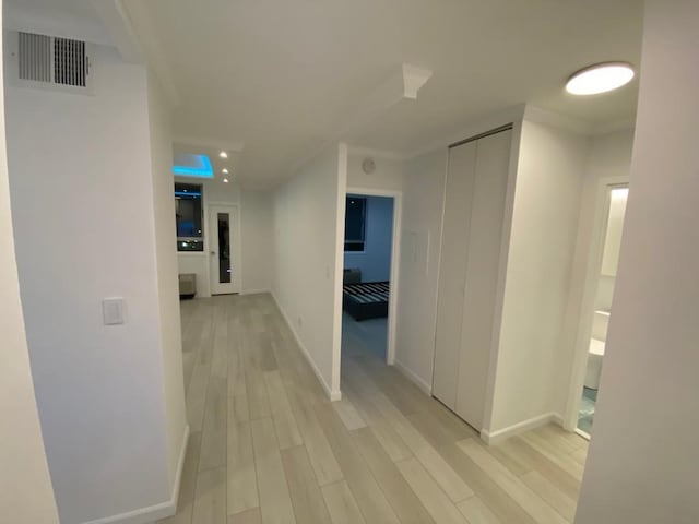 100 Manhattan Ave Unit 1301, Union City, NJ 07087 - hallway featuring light wood-style flooring and baseboards