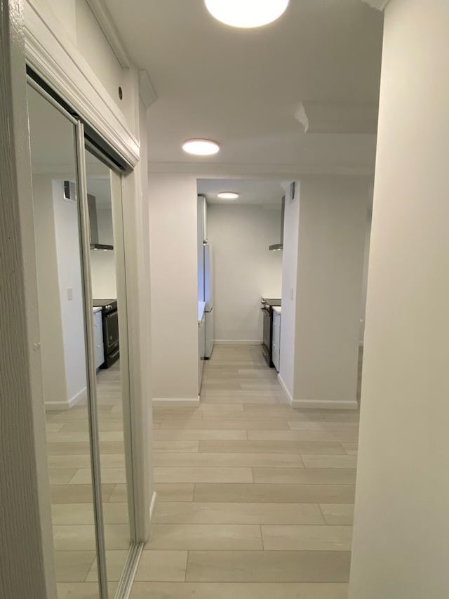 100 Manhattan Ave Unit 1301, Union City, NJ 07087 - hallway with baseboards and light wood-style floors