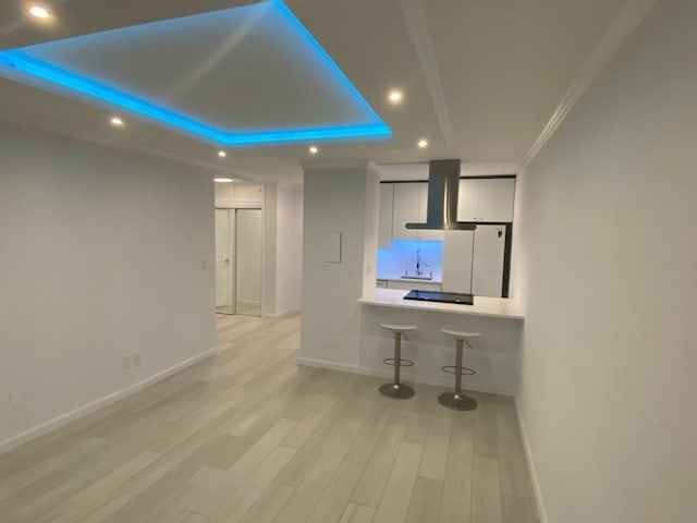 100 Manhattan Ave Unit 1301, Union City, NJ 07087 - unfurnished living room with recessed lighting, light wood-style floors, and crown molding