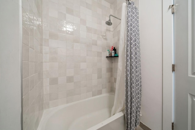 full bathroom featuring shower / tub combo with curtain