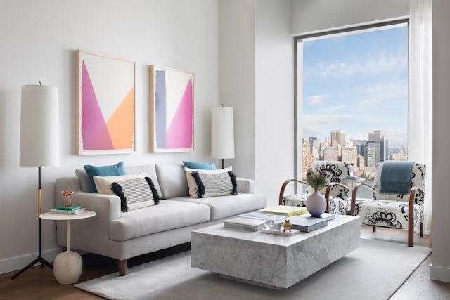 99 Hudson St Unit 4100, Jersey City, NJ 07302 - living room featuring wood finished floors, plenty of natural light, and a city view