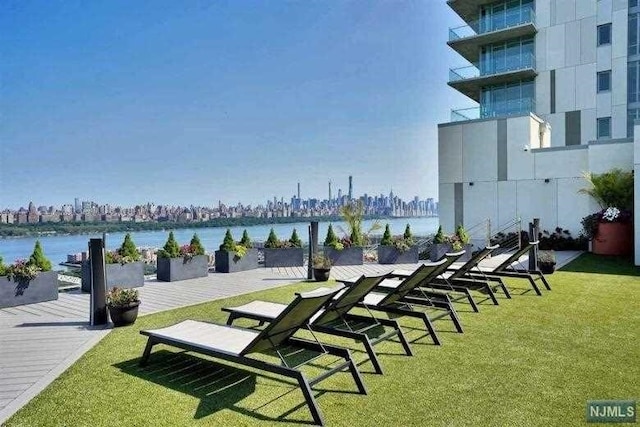 320 Adolphus Ave Unit 1415, Cliffside Park, NJ 07010 - view of property's community featuring a yard and a water view