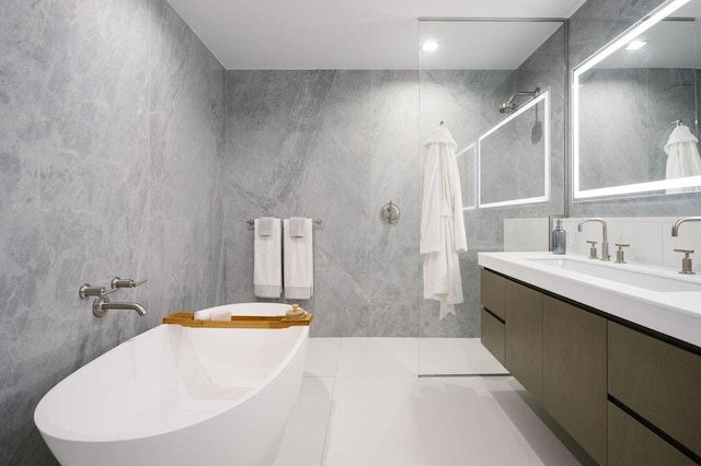 320 Adolphus Ave Unit 1415, Cliffside Park, NJ 07010 - full bath featuring vanity, a freestanding tub, tile walls, and a walk in shower