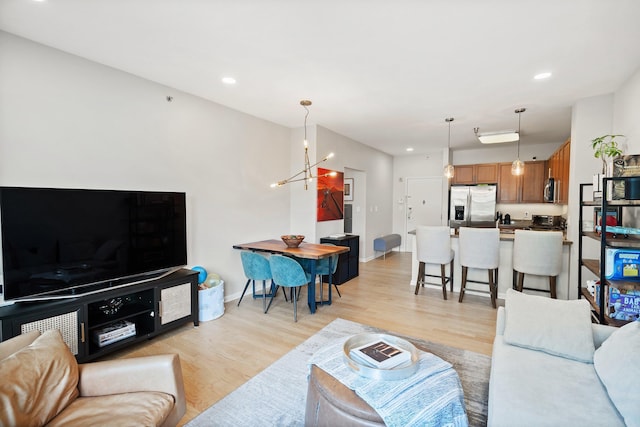 30 Freedom Way Unit 302, Jersey City, NJ 07305 - living room featuring light wood-style flooring, a chandelier, and recessed lighting
